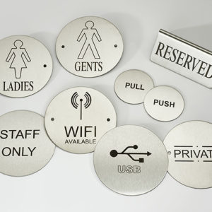 Assorted stainless steel signs